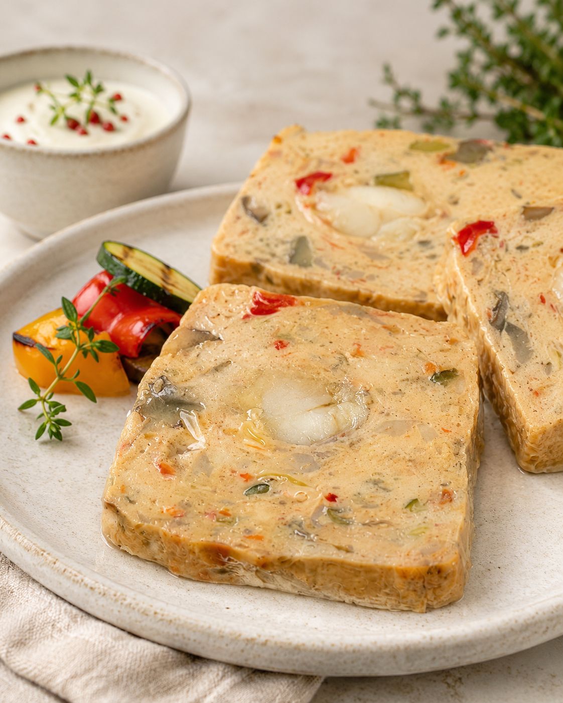Terrine de St Jacques aux légumes d'été et son cœur de colin affiné